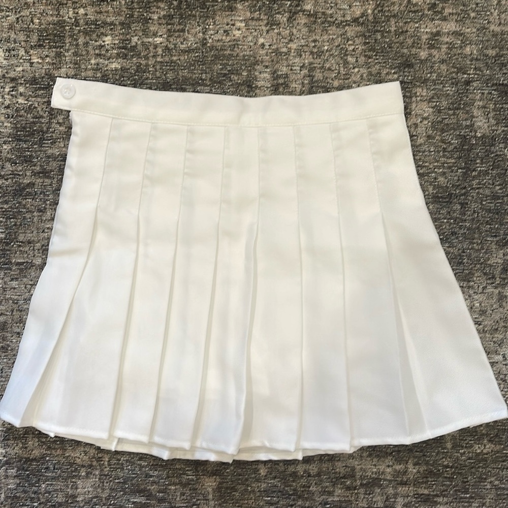 White pleated skirt